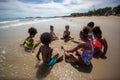 Kids playing running on sand at the beach, A group of children holding hands in a row on the beach in summer, rear view against Royalty Free Stock Photo