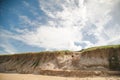 Kids playing on the sand dunes at the beach, Coffs Harbour Australia