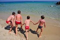 Kids playing on the Scoglio di Peppino beach