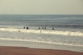 Kids playing in sea waves