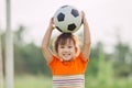 Kids playing soccer football.