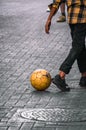 Kids playing soccer in the streets Royalty Free Stock Photo