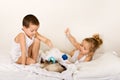 Kids playing with their kitten Royalty Free Stock Photo