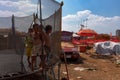 Kids playing at the trampoline at the music scene area after Cambodia beer event party Royalty Free Stock Photo