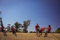 Kids playing tug of war during obstacle course training Royalty Free Stock Photo