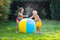 Kids playing with water ball toy Royalty Free Stock Photo