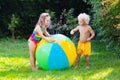 Kids playing with water ball toy Royalty Free Stock Photo