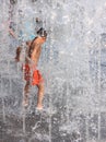 Kids Playing in water fountains