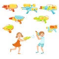 Kids Playing With Water Pistols And Assortment Of Guns