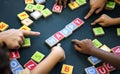 Kids playing wooden alphabets letters vocabulary ga Royalty Free Stock Photo