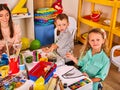 Children painting and drawing together. Craft lesson in primary school. Royalty Free Stock Photo