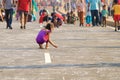 Playing on a holiday at beach road in morning sunlight