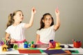 Kids with ponytails create imaginary artwork. Childhood and art concept Royalty Free Stock Photo