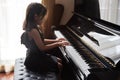 Kids practice play piano for up skill of music