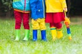 Kids in rain boots. Rubber boots for children. Royalty Free Stock Photo