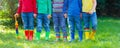 Kids in rain boots. Rubber boots for children Royalty Free Stock Photo