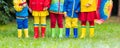 Kids in rain boots. Rubber boots for children. Royalty Free Stock Photo