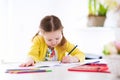 Kids read, write and paint. Child doing homework. Royalty Free Stock Photo