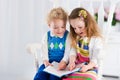 Kids reading a book Royalty Free Stock Photo