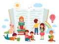 Kids reading books. Children in group enjoying literature, loving to read. Boys and girls learning or studying Royalty Free Stock Photo