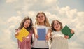 Kids reading books. three girls writing in notebook. back to school. write memories in diary. Education and school Royalty Free Stock Photo