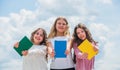 Kids reading books. three girls writing in notebook. back to school. write memories in diary. Education and school Royalty Free Stock Photo