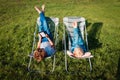 Kids relax in garden, boy and girl spend summer in the country Royalty Free Stock Photo
