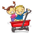 Kids Riding on a Red wagon Royalty Free Stock Photo