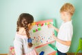 Kids role games, little teacher learn the classmate