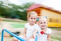 Kids rotate on a carousel Royalty Free Stock Photo