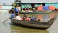 Kids rowing boat, Tonle Sap, Cambodia Royalty Free Stock Photo