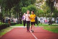 Kids run. Healthy sport. Child sport, heterosexual twins running on track, fitness. Joint training. Running training outdoor Royalty Free Stock Photo