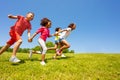 Kids run very fast in the park holding hands smile Royalty Free Stock Photo
