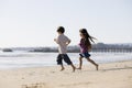 Kids Running on Beach Royalty Free Stock Photo