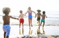 Kids running on the beach Royalty Free Stock Photo