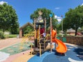 Colorful playground with kids playing in Texas, America