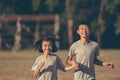 Kids running and playing on field Royalty Free Stock Photo