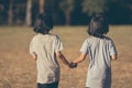 Kids running and playing on field Royalty Free Stock Photo