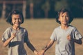 Kids running and playing on field Royalty Free Stock Photo