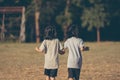 Kids running and playing on field Royalty Free Stock Photo