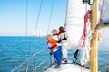 Kids sail on yacht in sea. Child sailing on boat. Royalty Free Stock Photo