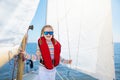 Kids sail on yacht in sea. Child sailing on boat Royalty Free Stock Photo