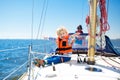 Kids sail on yacht in sea. Child sailing on boat. Royalty Free Stock Photo