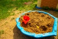 Kids sand playground toys on the grass Royalty Free Stock Photo