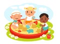 Kids in sandbox. Children play with plastic sand molds and scoops. Cute babies with buckets or toys. Infants outdoor