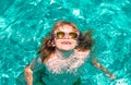 Kids on sea beach. Happy kid playing in swimming pool on summer day. Child water vacation. Children play in tropical Royalty Free Stock Photo