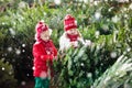 Kids select Christmas tree. Family buying Xmas tree. Royalty Free Stock Photo