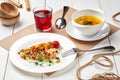 Kids set lunch of meat broth, rice with vegetables and chicken skewer, berry drink Royalty Free Stock Photo