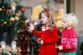 Kids shopping for Christmas presents. Children buy Xmas decoration Royalty Free Stock Photo