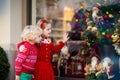 Kids shopping for Christmas presents. Children buy Xmas decoration Royalty Free Stock Photo